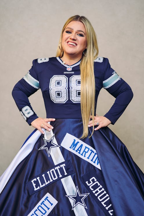 PHOENIX, AZ - FEBRUARY 09: Kelly Clarkson poses for a photo while wearing a Dallas Cowboys dress dur…