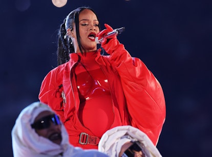 Rihanna performs onstage during the Apple Music Super Bowl LVII Halftime Show at State Farm Stadium