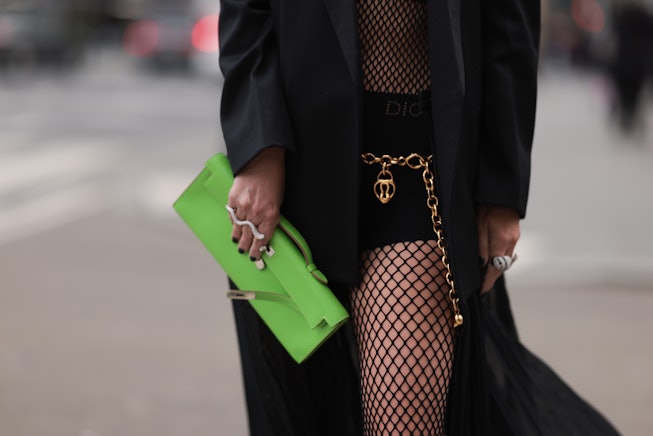 NEW YORK, NEW YORK - FEBRUARY 12: Corina Mihaila Larpin
wearing Peter Do black blazer, Dior black br...