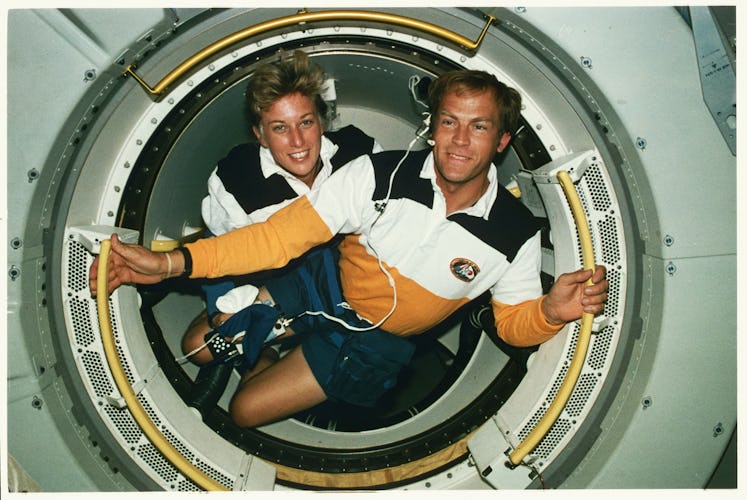 Jan Davis and Mark Lee, the first married couple in space, aboard the shuttle Endeavor.   (Photo by ...