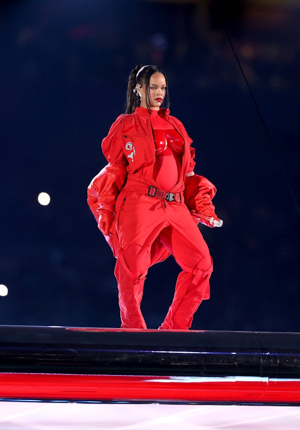 Rihanna wore Fenty Beauty makeup by Priscilla Ono, red CND nail polish, and hair by hairstylist Yuse...