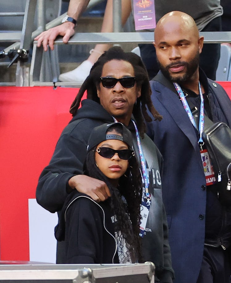 Jay-Z and Blue Ivy Carter attend the Super Bowl LVII Pregame, and Jay-Z took Blue Ivy's Instagram pi...