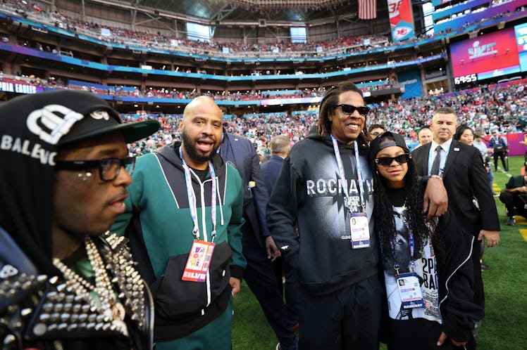 Jay-Z poses with his daughter Blue Ivy Carter at Super Bowl LVII after Jay-Z took Blue Ivy's Instagr...