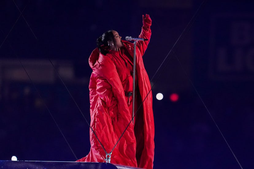 Rihanna added a puffer coat by Alaïa to her Loewe look.  