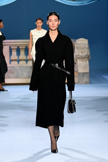 NEW YORK, NEW YORK - FEBRUARY 13: A model walks the runway wearing Tory Burch during Fall/Winter 202...