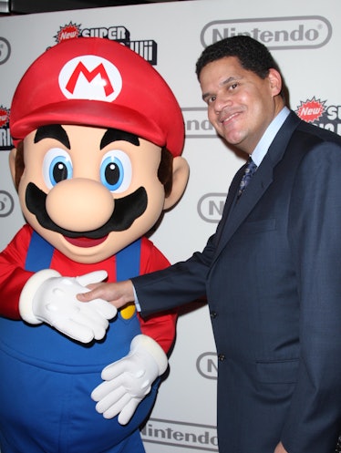 NEW YORK CITY, NY - NOVEMBER 12: Mario and Reggie Fils-Amie attend NINTENDO Celebrates the Launch of...