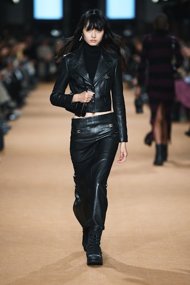 Model on the runway at Coach Fall 2023 Ready To Wear Fashion Show at Park Avenue Armory on February ...