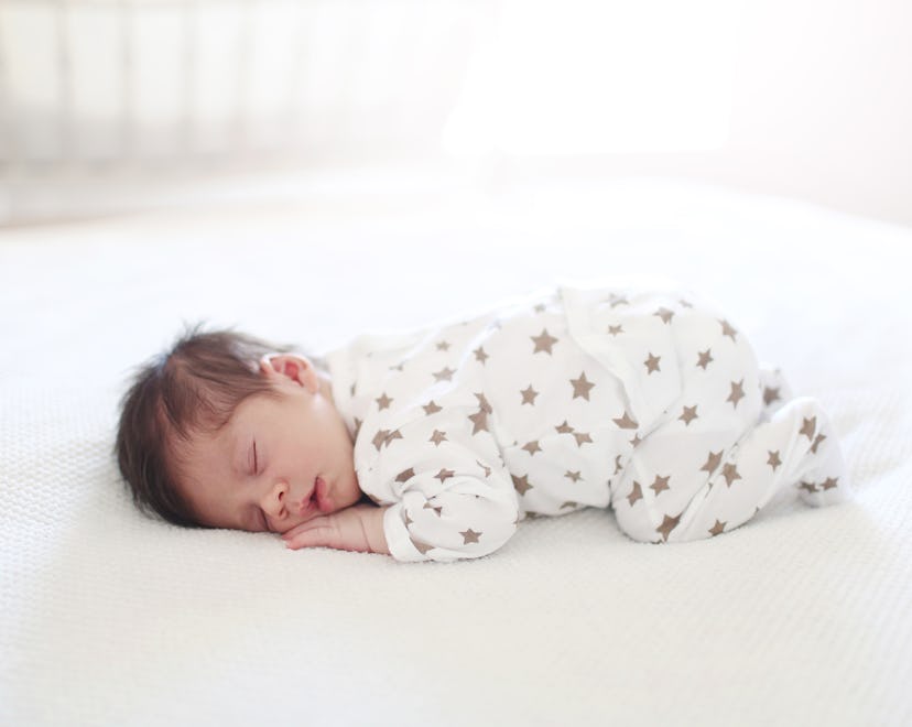 a cute sleeping baby, the 4 month sleep regression survival tips