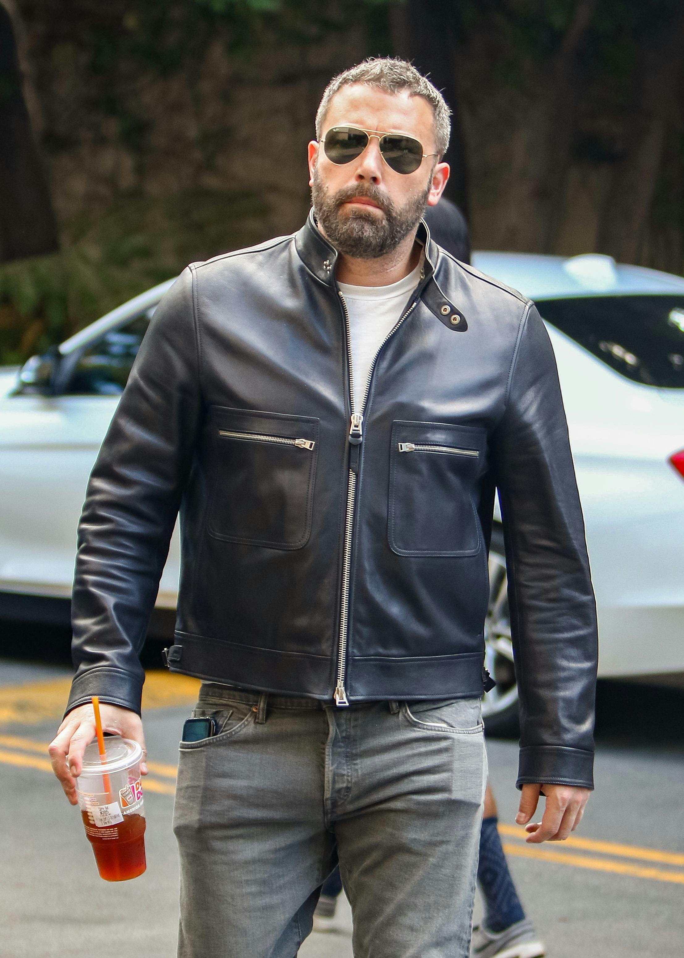 Ben Affleck drinks a Dunkin' iced coffee.