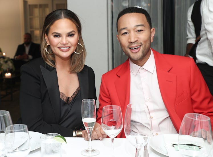 Chrissy Teigen and John Legend (Photo by John Salangsang/WWD/Penske Media via Getty Images)