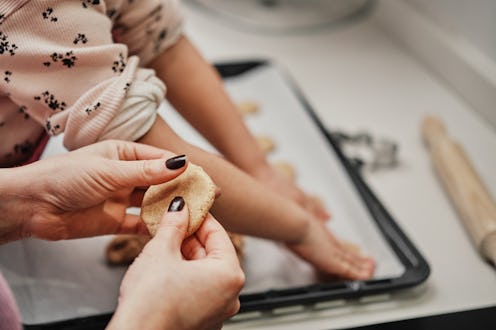Mom And Daughter Make Ginger Bread Cookies