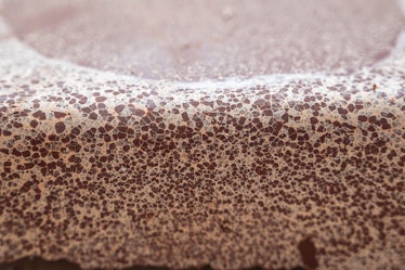 Close-up of bloomed chocolate caused by a bad tempering and the proliferation of wrong kind of cryst...