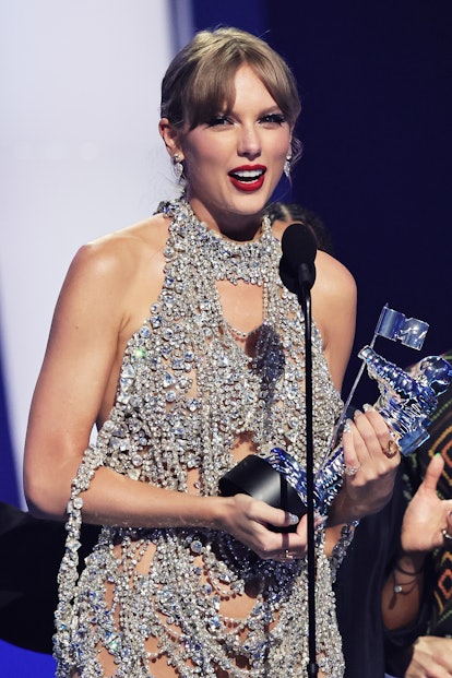 NEWARK, NEW JERSEY - AUGUST 28: Taylor Swift accepts an award onstage at the 2022 MTV VMAs at Pruden...