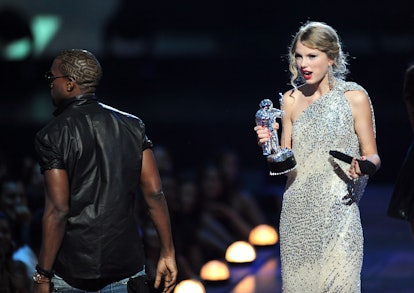 NEW YORK - SEPTEMBER 13:  Kanye West takes the microphone from Taylor Swift and speaks onstage durin...