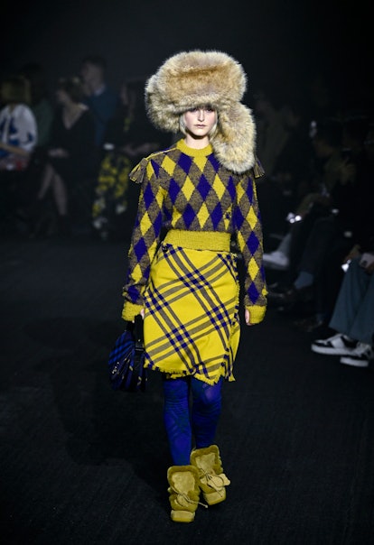 A model walks the runway at the Burberry show during London Fashion Week February 2023