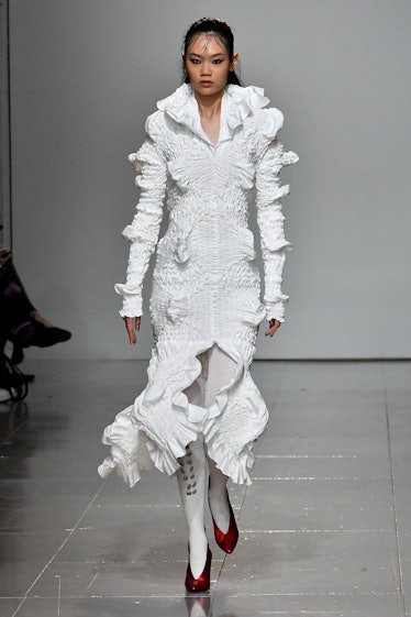 LONDON, ENGLAND - FEBRUARY 19: A model walks the runway during the Feben Ready to Wear Fall/Winter 2...