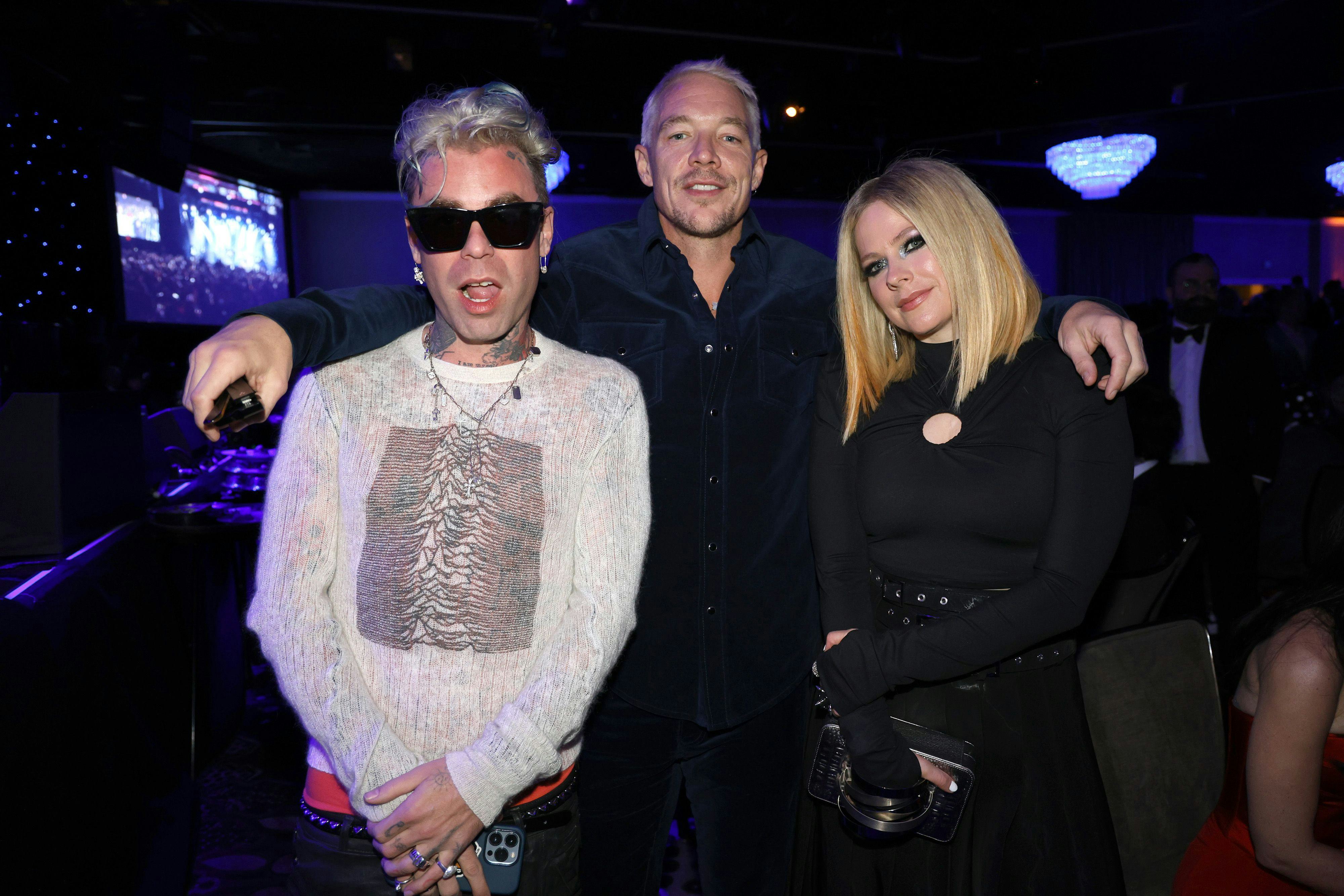 LOS ANGELES, CALIFORNIA - FEBRUARY 04: (L-R) Mod Sun, Diplo, and Avril Lavigne attend the Pre-GRAMMY&hellip;