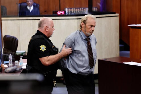 Curtis Edward Smith, 62, is taken back to jail after a judge revoked his bond at a hearing on Thursd...