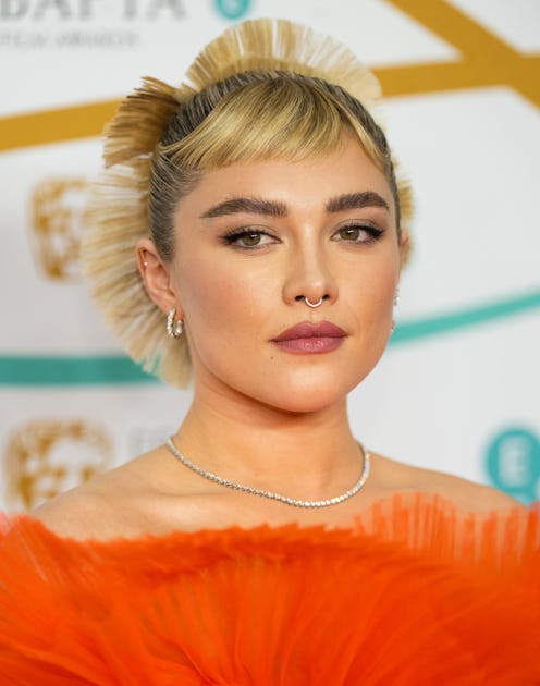 Florence Pugh’s BAFTAs “Fans & Bangs” Were Inspired By Audrey Hepburn