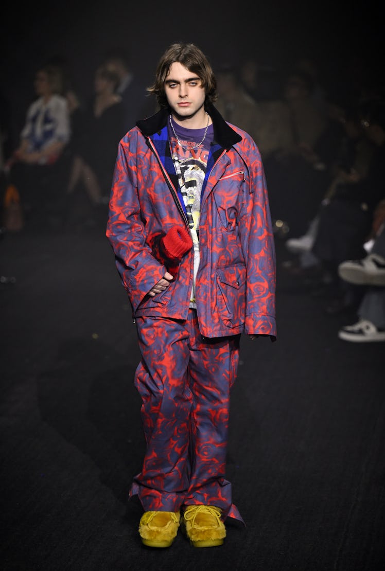 LONDON, ENGLAND - FEBRUARY 20: Lennon Gallagher walks the runway at the Burberry show during London ...