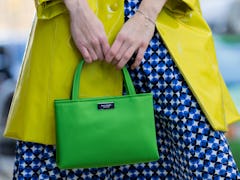 Woman carrying Kate Spade bag