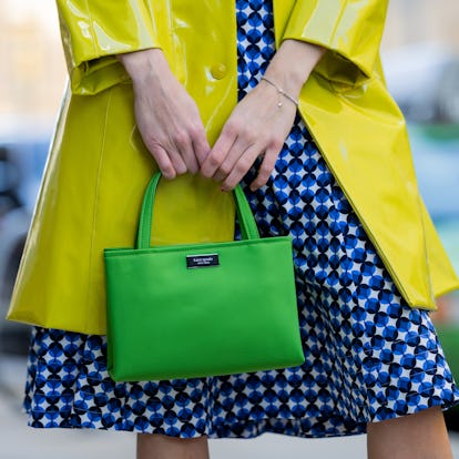 Woman carrying Kate Spade bag