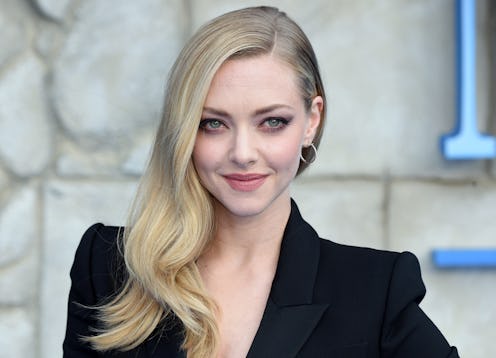 Amanda Seyfried poses on the red carpet upon arrival for the world premiere of the film "Mamma Mia! ...