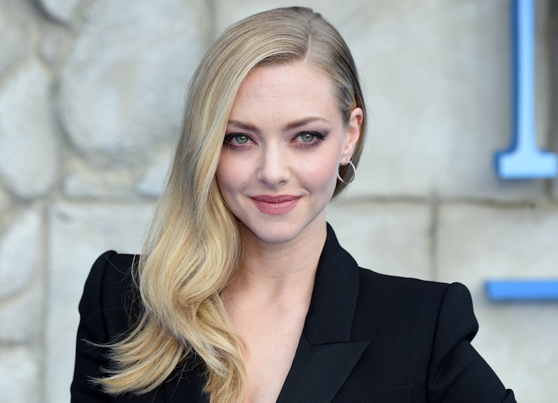 Amanda Seyfried poses on the red carpet upon arrival for the world premiere of the film "Mamma Mia! ...