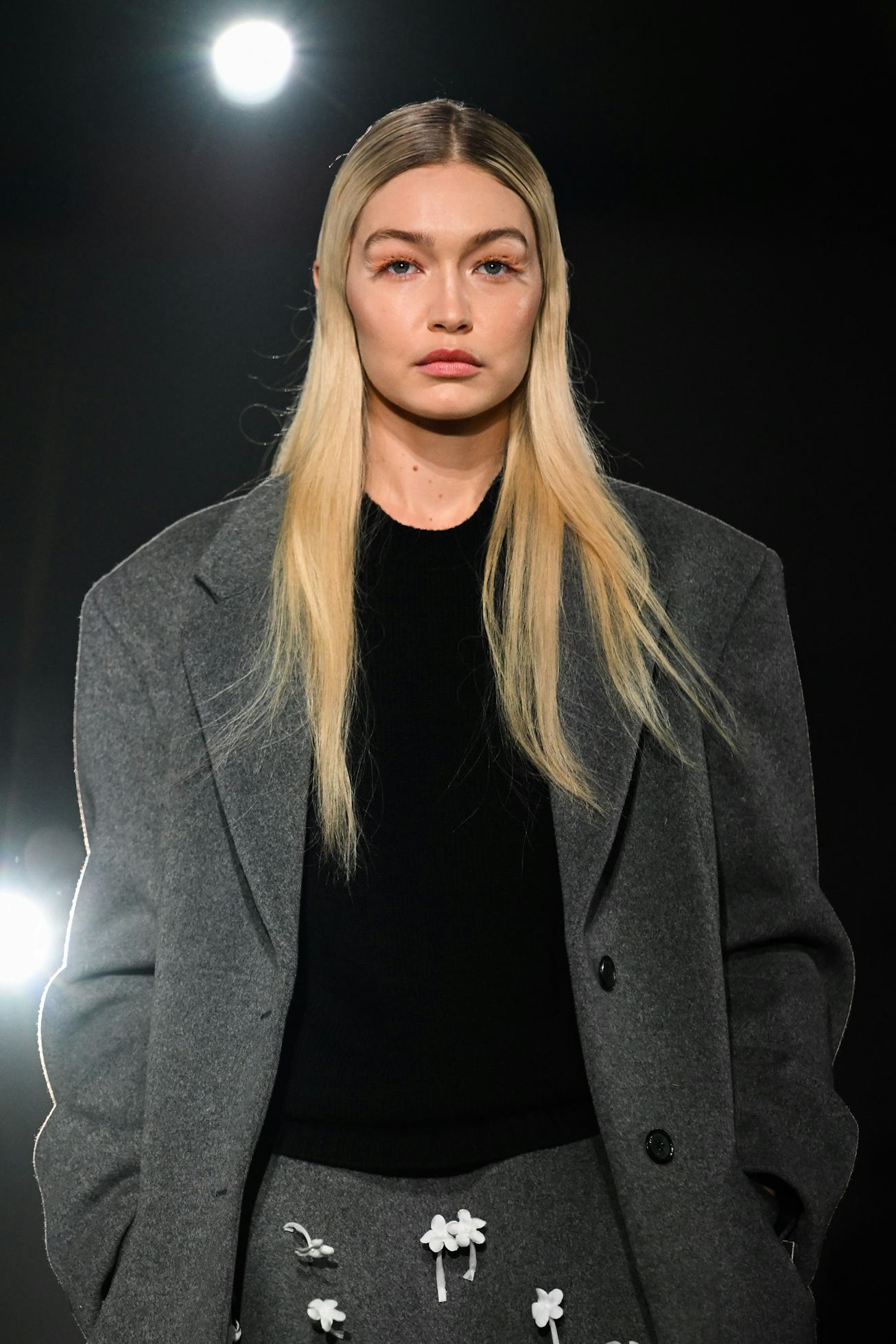 US model Gigi Hadid presents a creation for Prada on February 23, 2023 during the Fall-Winter 2023-2...