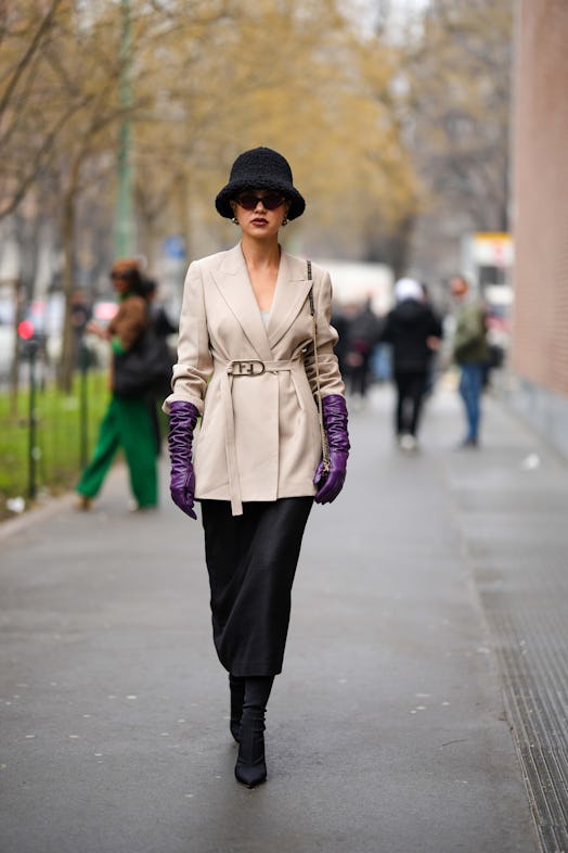 Bucket hats and accessories were a beauty street style trend at Milan Fashion Week F/W 2023