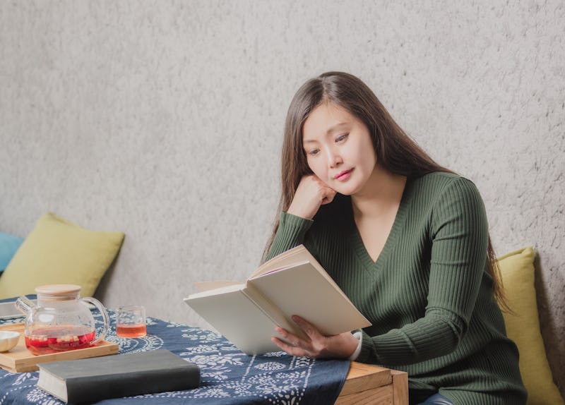 woman reading a book