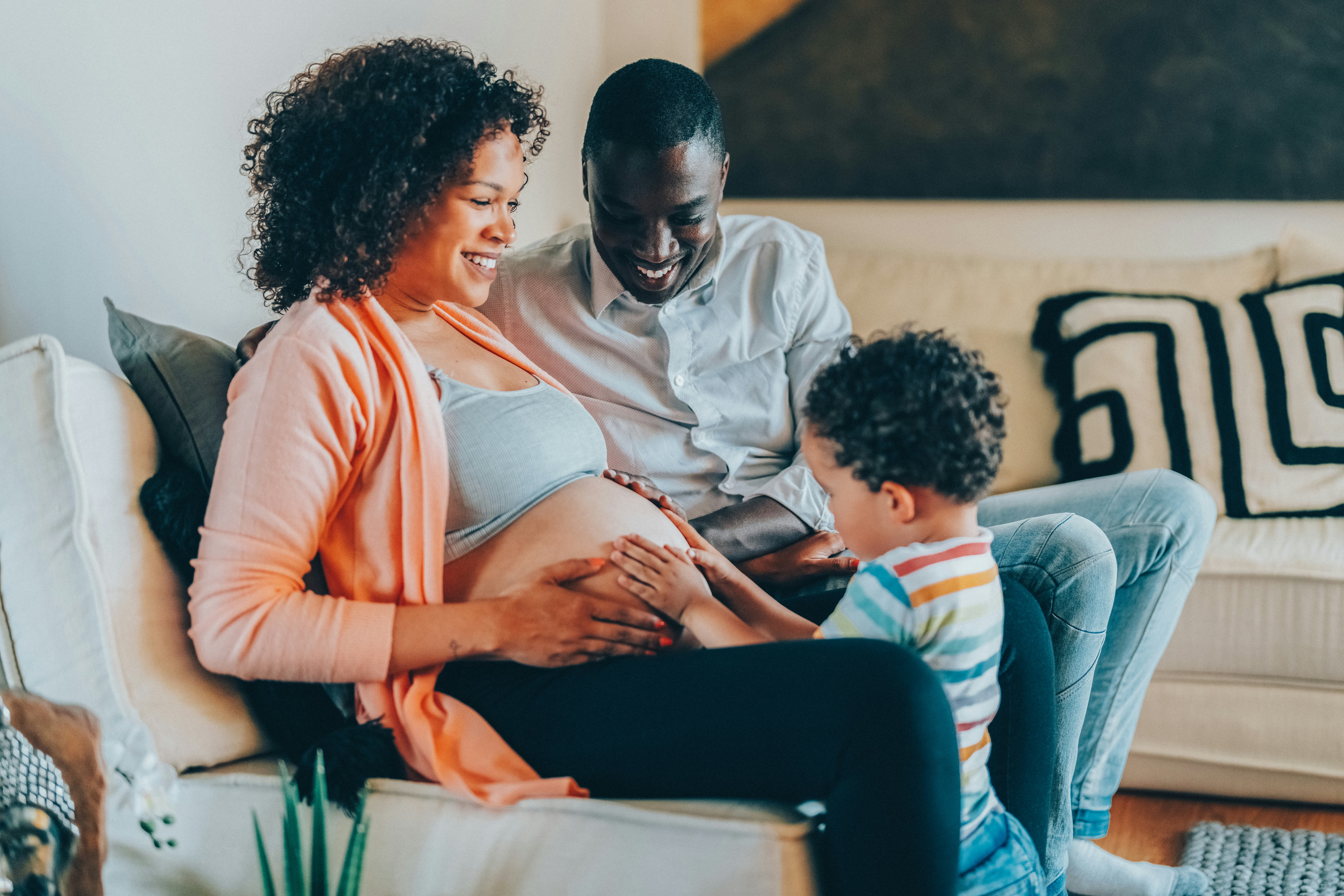 Family feeling happy about the new family member