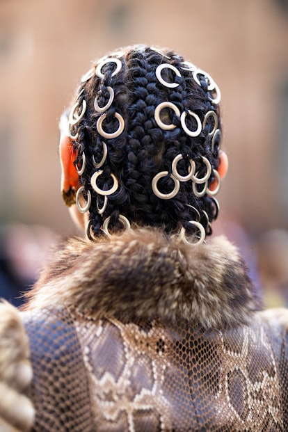 Metallic hair accessories ae beauty street style trend during Milan Fashion Week Womenswear Fall/Win...
