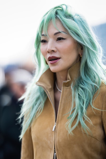 Colorful blue hair is a beauty street style trend from Milan Fashion Week Womenswear Fall/Winter 202...