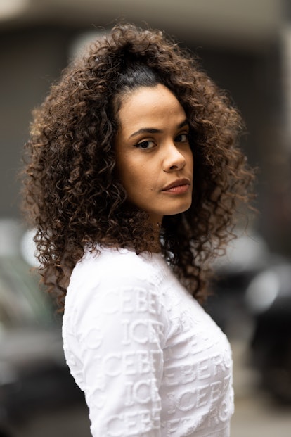 Martina Hamdy's natural curls are a beauty street style trend during Milan Fashion Week Womenswear F...