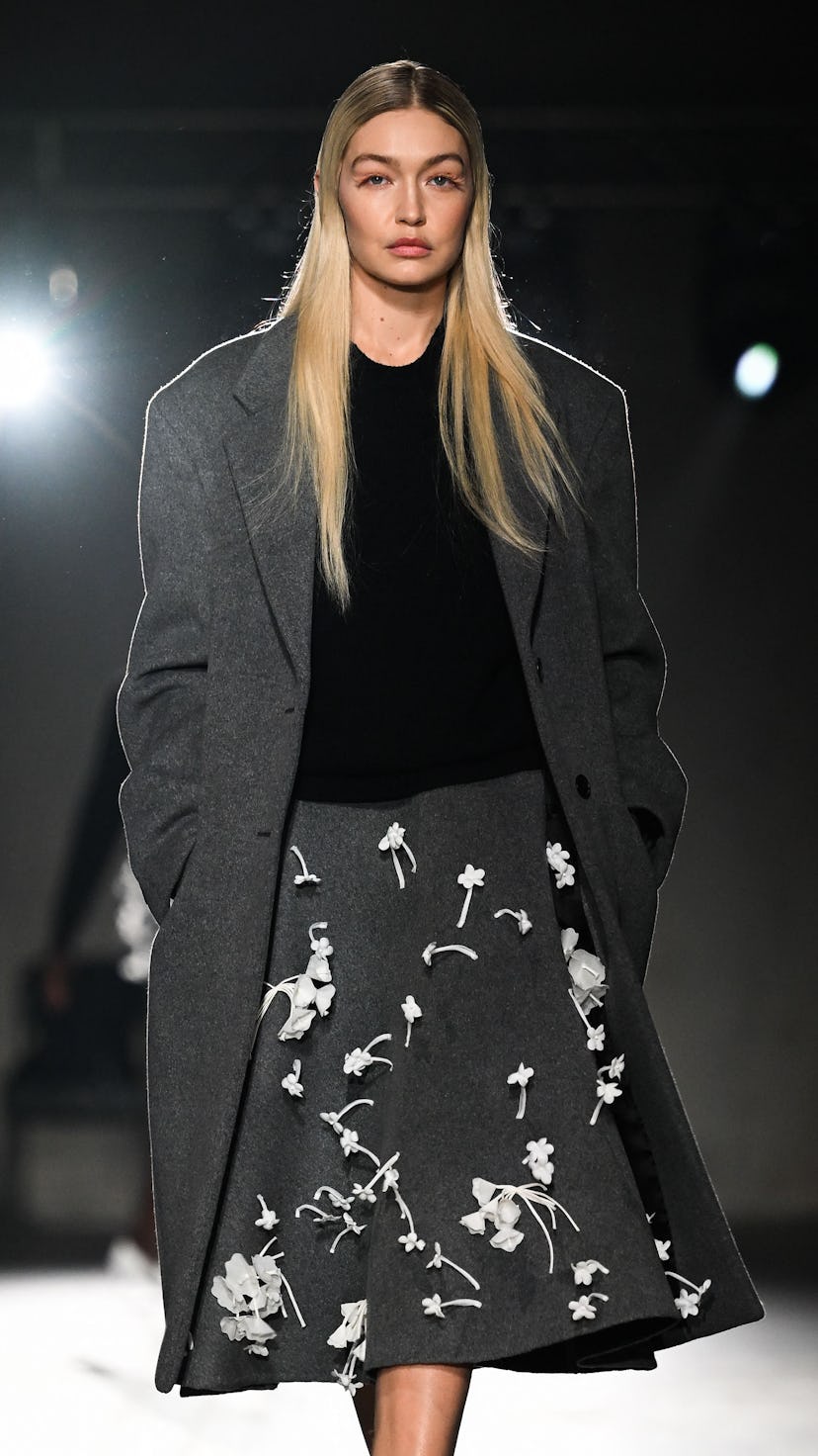 US model Gigi Hadid presents a creation for Prada on February 23, 2023 during the Fall-Winter 2023-2...
