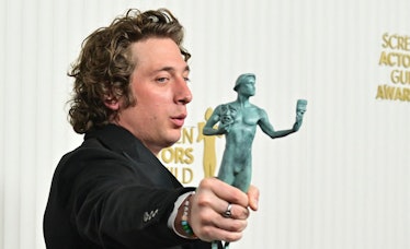 Actor Jeremy Allen White poses with the award for outstanding Male Actor in a Comedy Series for "The...