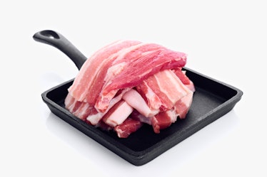 An image of bacon slices on a pan.