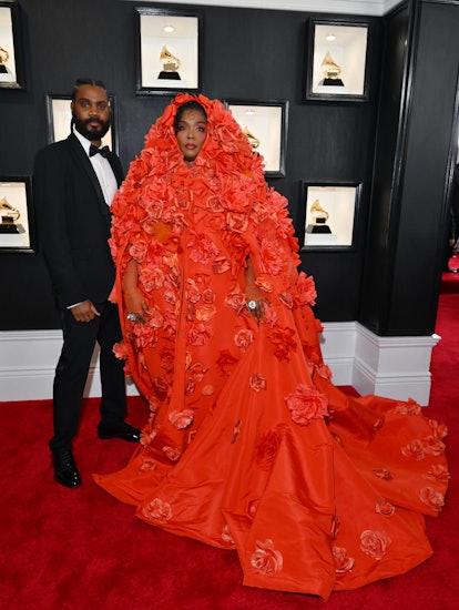 Lizzo attends the 65th Grammys with boyfriend Myke Wright. Photo by Lester Cohen/Getty Images for Th...