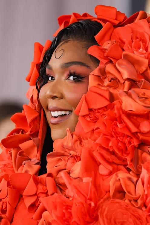 Lizzo orange makeup at the 65th GRAMMY Awards on February 05, 2023 in Los Angeles, California. (Phot...