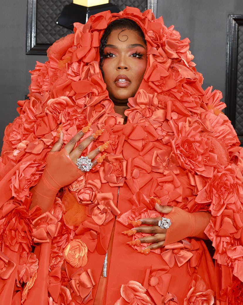 Lizzo orange makeup at the 65th GRAMMY Awards on February 05, 2023 in Los Angeles, California. (Phot...
