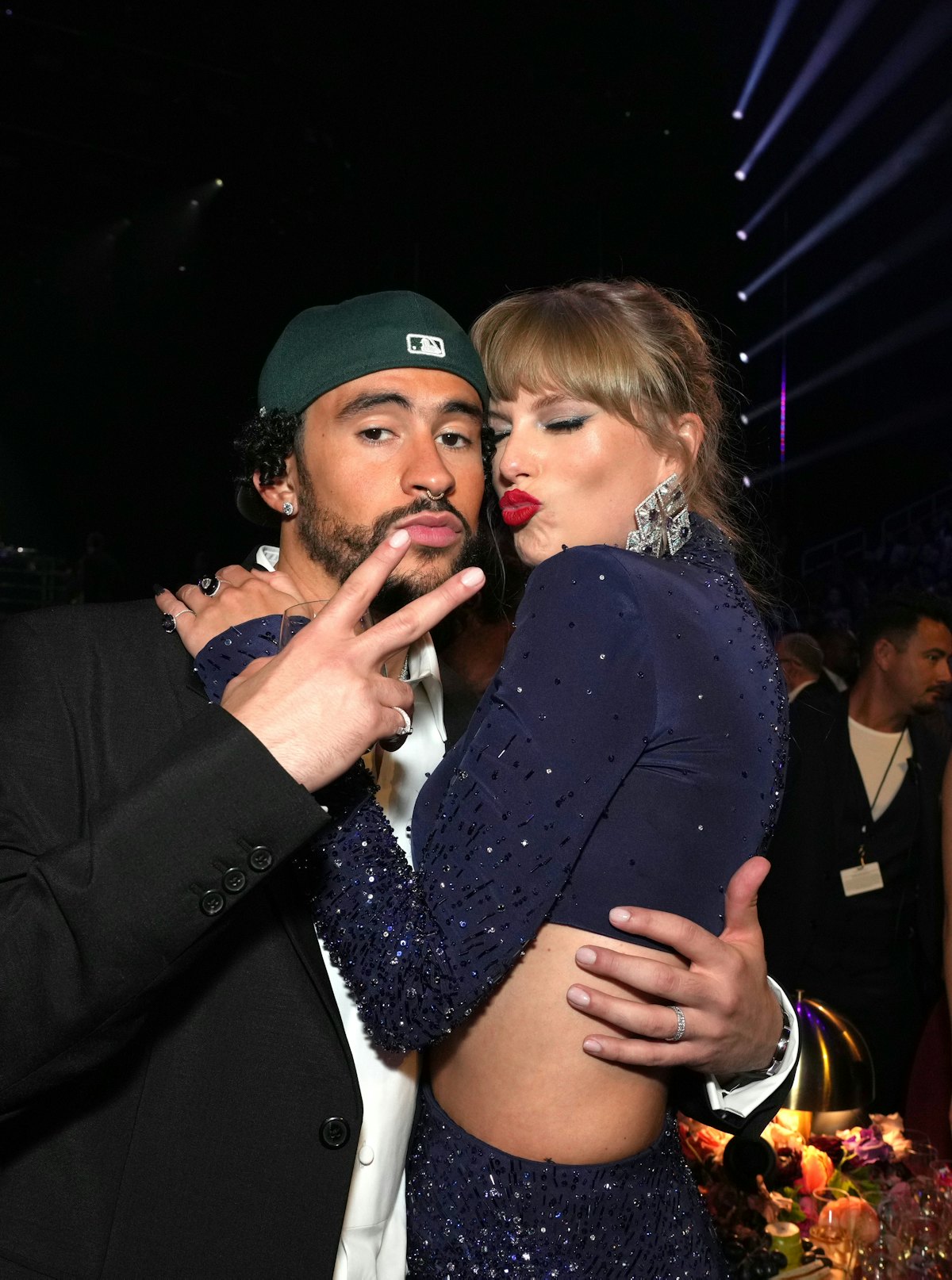 LOS ANGELES, CALIFORNIA - FEBRUARY 05: (L-R) Bad Bunny and Taylor Swift attend the 65th GRAMMY Award...