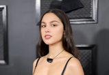 Olivia Rodrigo attends the 2023 GRAMMY Awards in a see-through black dress
