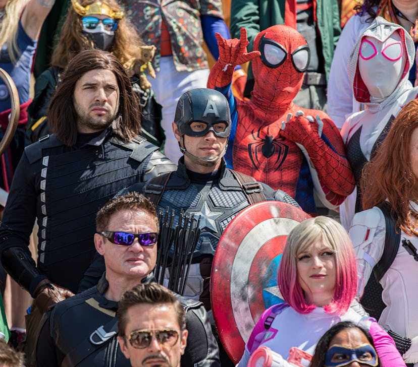 SAN DIEGO, CALIFORNIA - JULY 22:  A group of Marvel cosplayers pose for photos at 2022 Comic-Con Int...