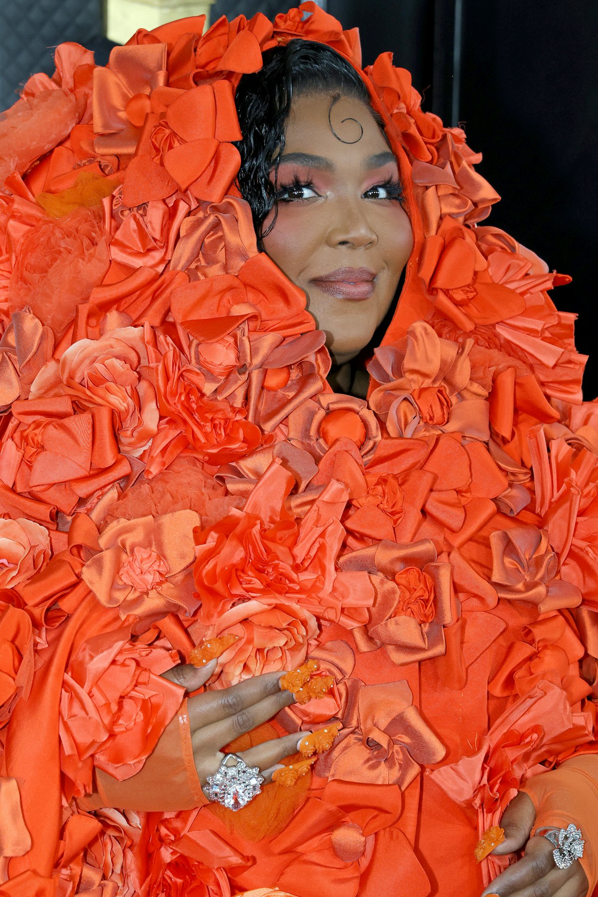 Lizzo's orange 3D nails were one of the best nail art moments at the Grammys in 2023.