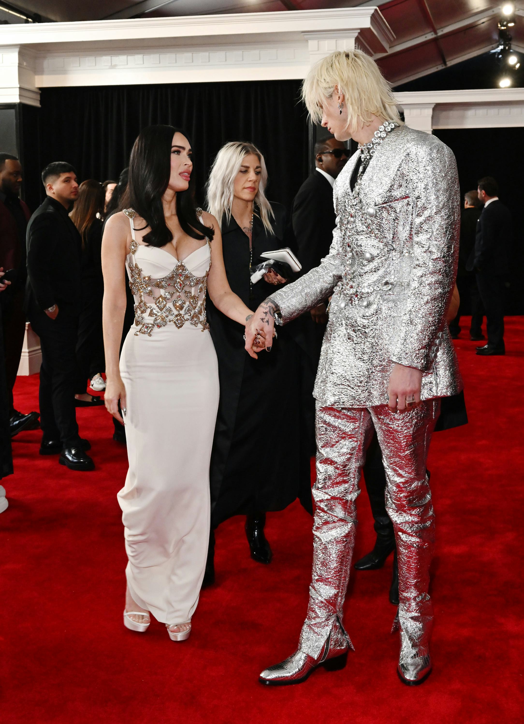 LOS ANGELES, CALIFORNIA - FEBRUARY 05: (L-R) Megan Fox and Machine Gun Kelly attend the 65th GRAMMY &hellip;