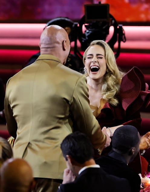 LOS ANGELES, CALIFORNIA - FEBRUARY 05: (L-R) Dwayne Johnson and Adele attend the 65th GRAMMY Awards ...
