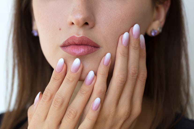  a pink to white ombre gradient is a pretty valentine's day nail design 