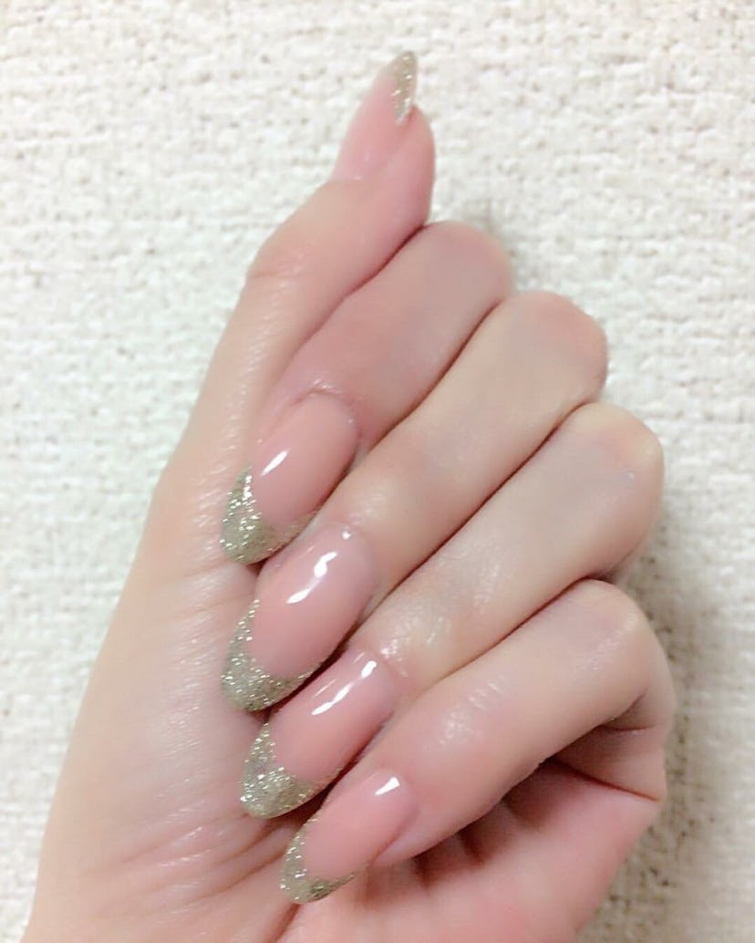 pink french manicure with silver glitter tips is a pretty valentine's day nail design