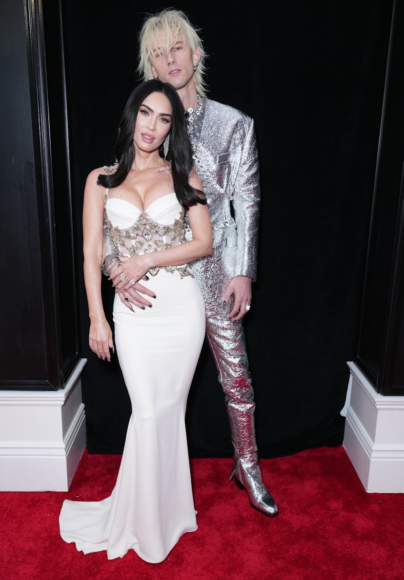 LOS ANGELES, CALIFORNIA - FEBRUARY 05: (L-R) Megan Fox and Machine Gun Kelly attend the 65th GRAMMY ...